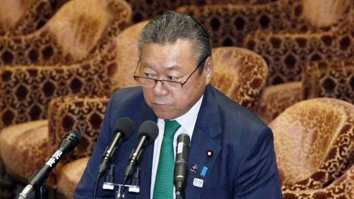 In Nov. 14, 2018, photo, ruling Liberal Democratic Party of Japan lawmaker Yoshitaka Sakurada, also in charge of the 2020 Tokyo Olympics, replies to question from independent and opposition legislators at a parliamentary session in Tokyo. 