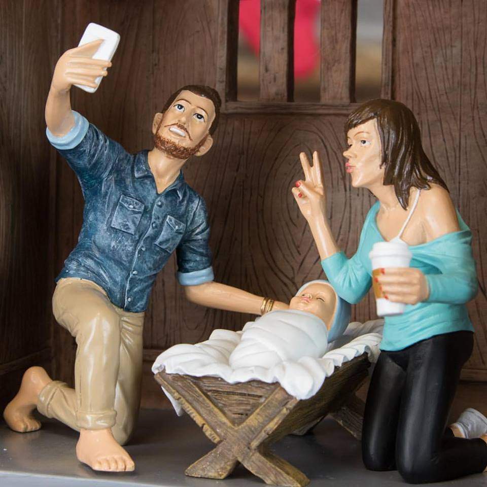 "Say cheese," Joseph and Mary take a photo with their new baby Jesus in this nativity scene at Montreal's St. Joseph's Oratory.