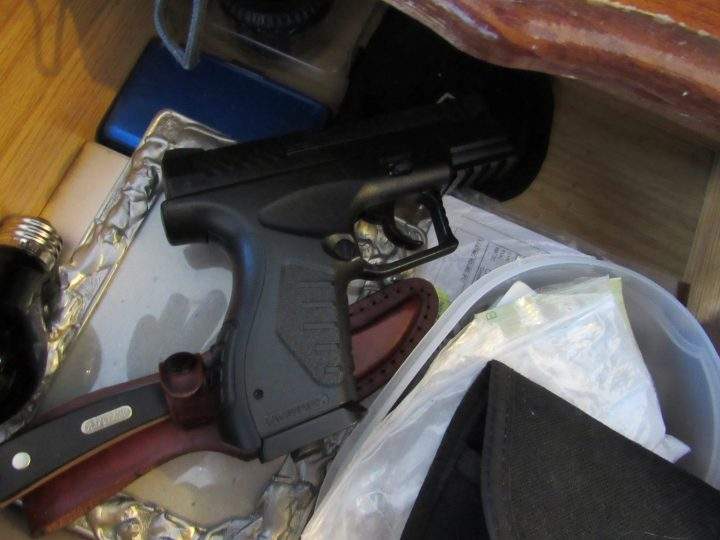 Five people were charged after Calgary police seized drugs, guns and bikes from a house in the city’s northwest.