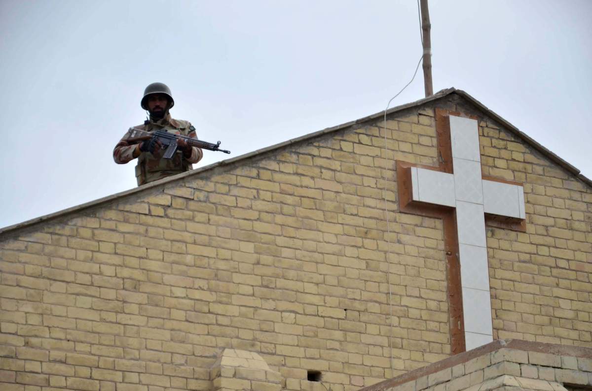 In this Dec. 25, 2017 file photo, a Pakistani soldier stands guard at a church that was attacked a week earlier by Islamic State militants in Quetta, Pakistan.
