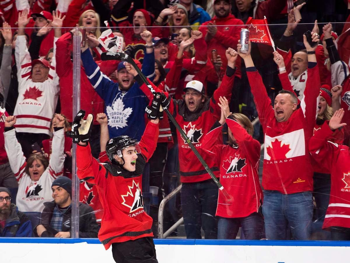 Canada forward Alex Formenton (24) celebrates his empty net goal against Sweden during third period gold medal final IIHF World Junior Championships hockey action in Buffalo, N.Y., on Friday, January 5, 2018. THE CANADIAN PRESS/Nathan Denette.