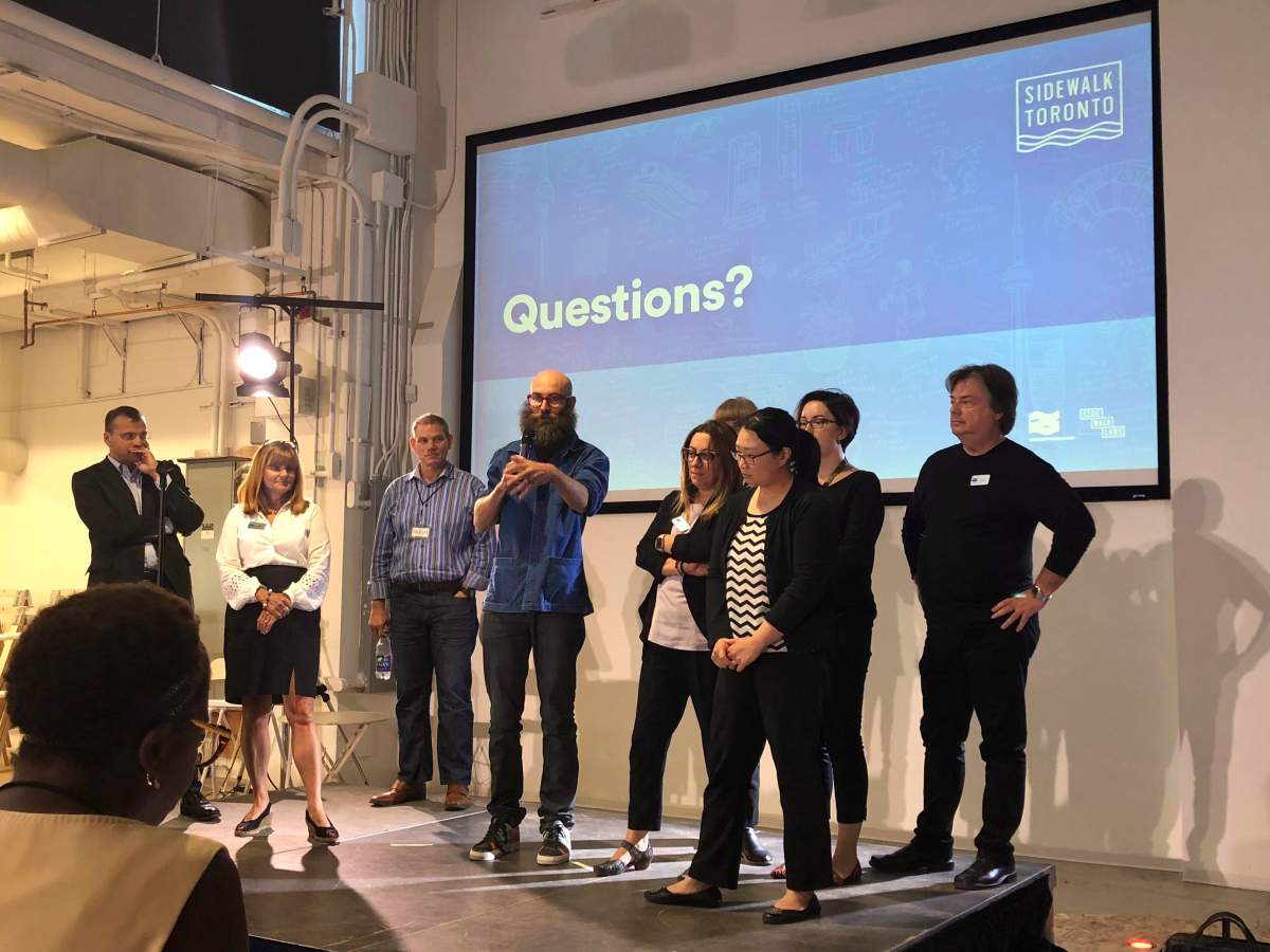 In this Aug. 15, 2018 photo, Jesse Shapins, director of public realm with Google affiliate Sidewalk Labs, takes questions at a public forum about a proposed development on Toronto’s waterfront in Toronto, Canada.
