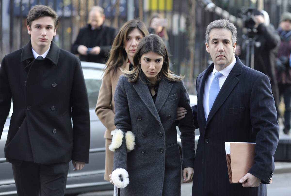 Cohen, 52, had walked into court on Wednesday morning with his wife, son and daughter, amid a crowd of photographers and reporters.