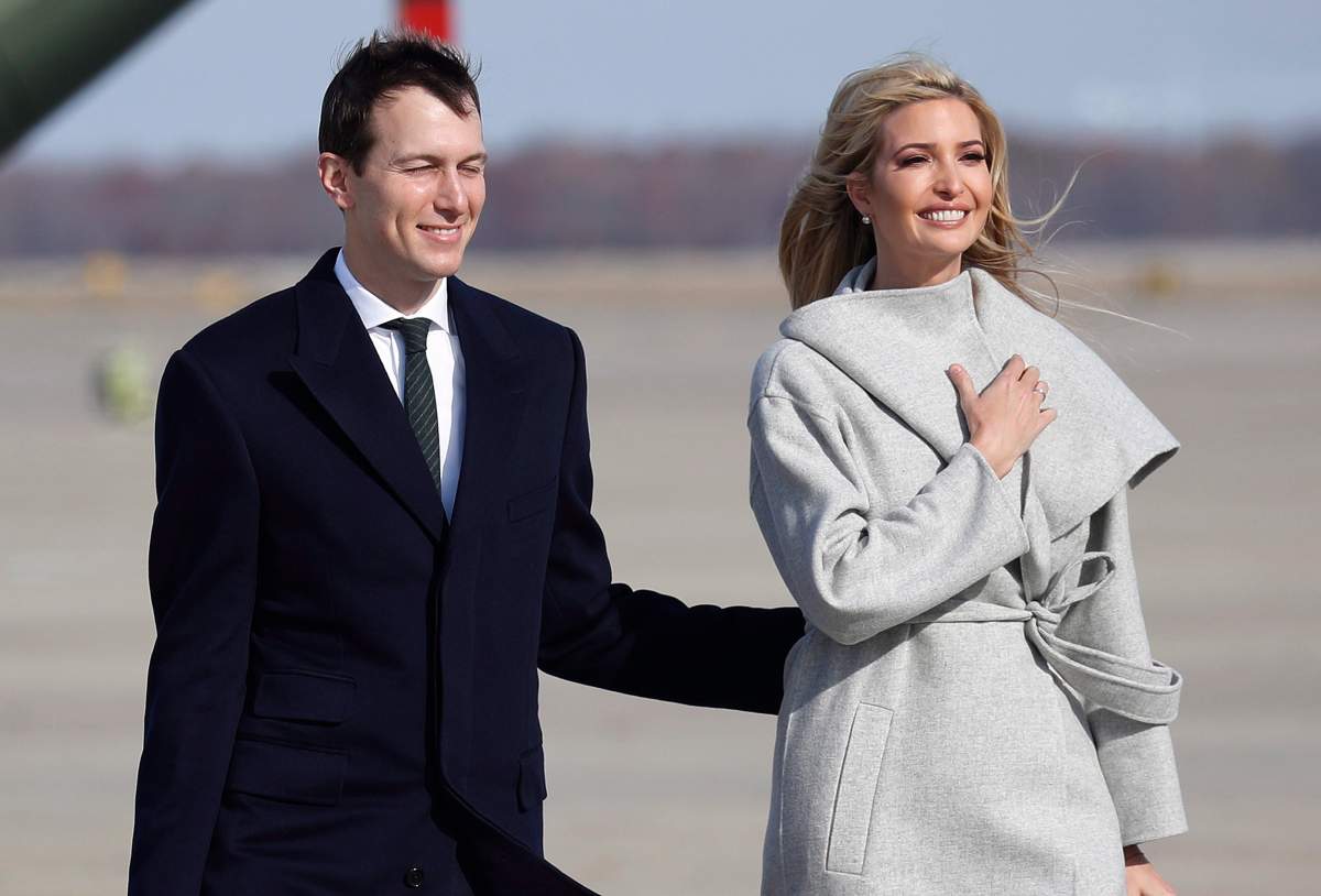 White House Senior Adviser Jared Kushner, left and Ivanka Trump, the daughter and assistant to President Donald Trump walk across the tarmac before boarding Air Force One, Thursday, Nov. 29, 2018 at Andrews Air Force Base, Md. 