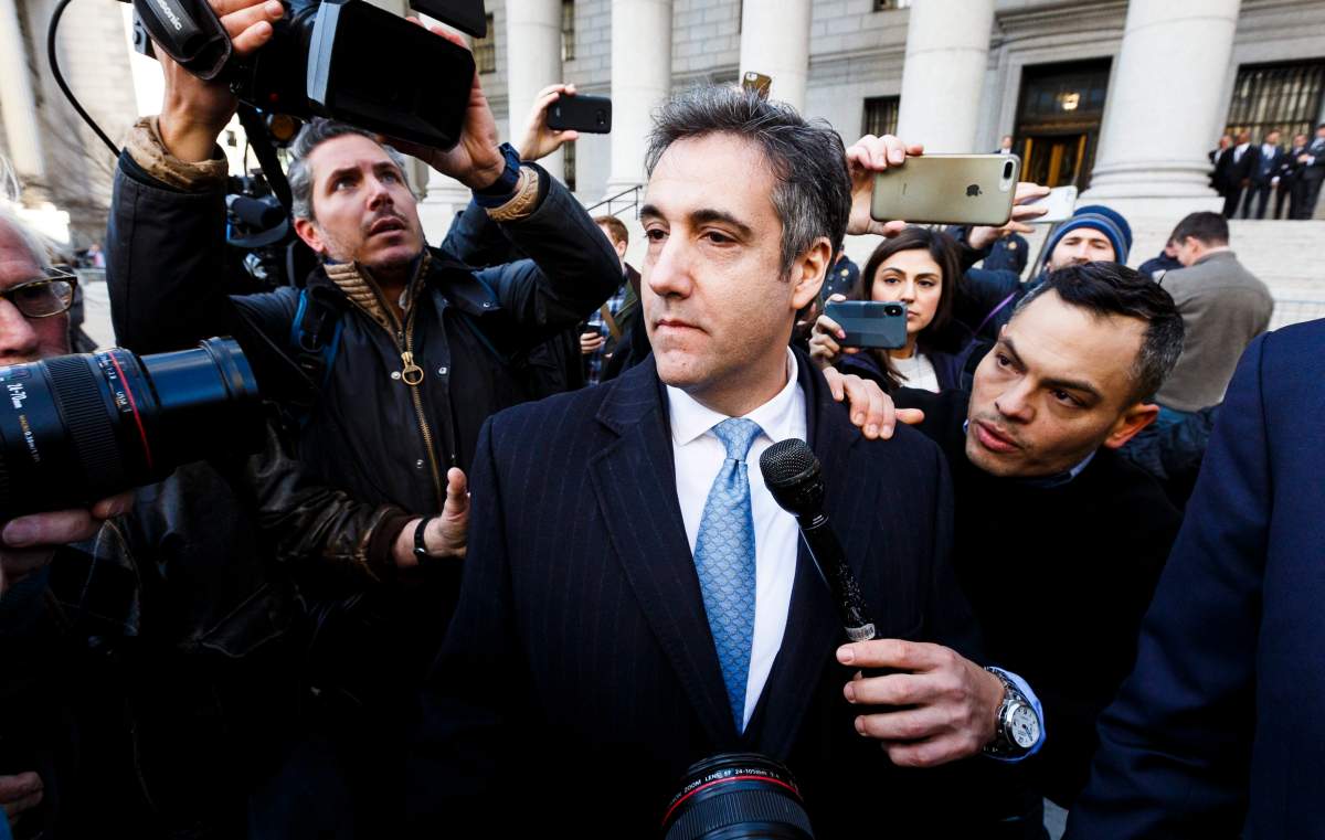 Michael Cohen (C), U.S. President Donald Trump’s former personal lawyer, leaves federal court after pleading guilty to charges related to lying to Congress in New York, Nov. 29, 2018.