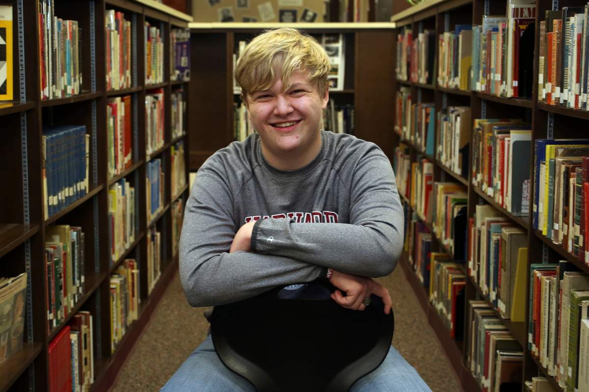 Ulysses High School senior Braxton Moral sits for a portrait at the school in Ulysses, Kan., on Wednesday, Dec. 12, 2018. 