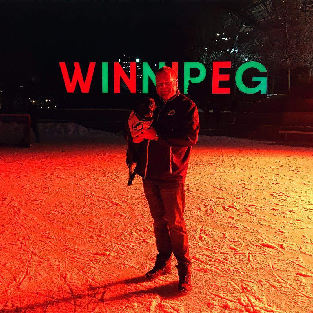 Adam Vosding and his dog Holland taking in the sights of the Forks.