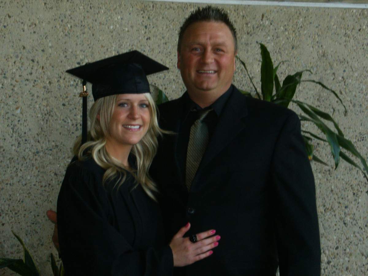 Ashley Mielke and her father at her university graduation in 2008