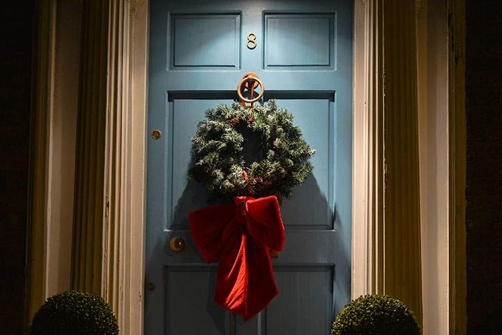 A Christmas wreath seen on a door of a house in this file photo.