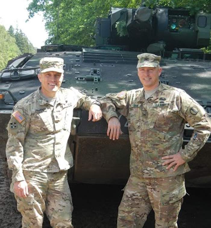 Former U.S. Army Col. Bryan Denny, right, is shown in this file photo.