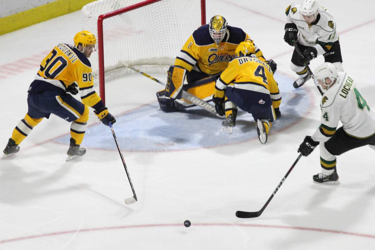 Will Lochead gets to a loose puck in the Erie zone.