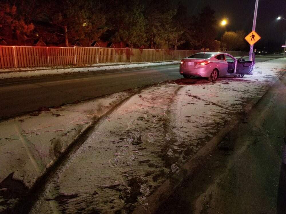 A Kingston woman was charged with impaired driving after she allegedly drove her car over a median.