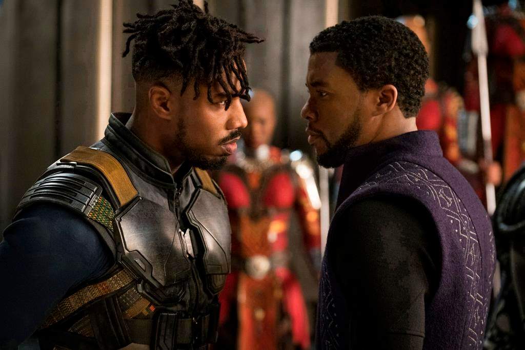 This image released by Disney shows Michael B. Jordan, left, and Chadwick Boseman in a scene from Marvel Studios’ “Black Panther.” (Matt Kennedy/Marvel Studios-Disney via AP)
