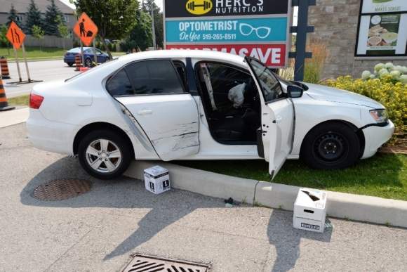 Ontario's Special Investigations Unit has cleared Guelph police of any wrongdoing after suspects in a bank robbery crashed their car on Gordon Street in August 2017.