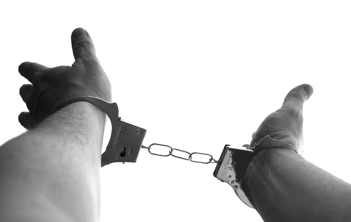 A man in handcuffs.