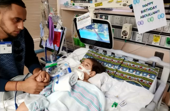 Ali Hassan with son Abdullah in UCSF Benioff Children’s Hospital in Oakland, Calif. The photo was taken on Abdullah’s second birthday.