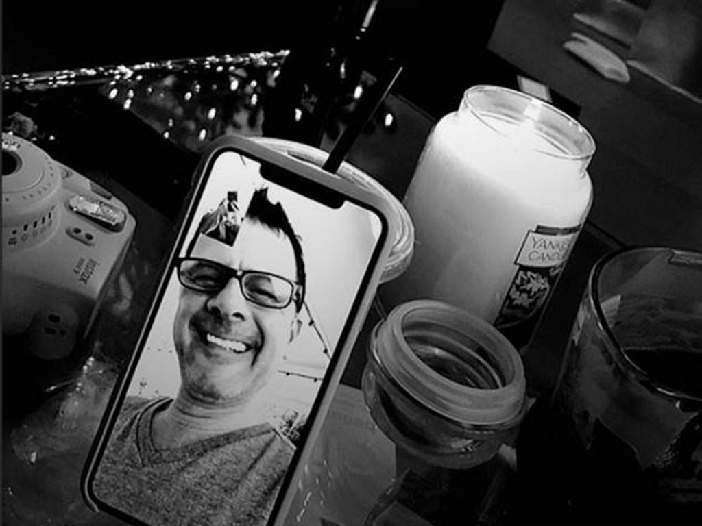 Ariana Grande’s father, Eddie Butera on the other end of a FaceTime call with his daughter on Dec. 25, 2018.