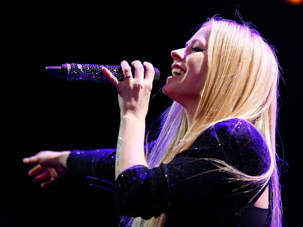 Avril Lavigne performs at the Jingle Ball at United Center on Dec. 9, 2013, in Chicago, Ill.