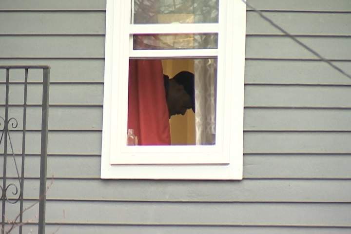 Peterborough police search a residence on Burnham Street.