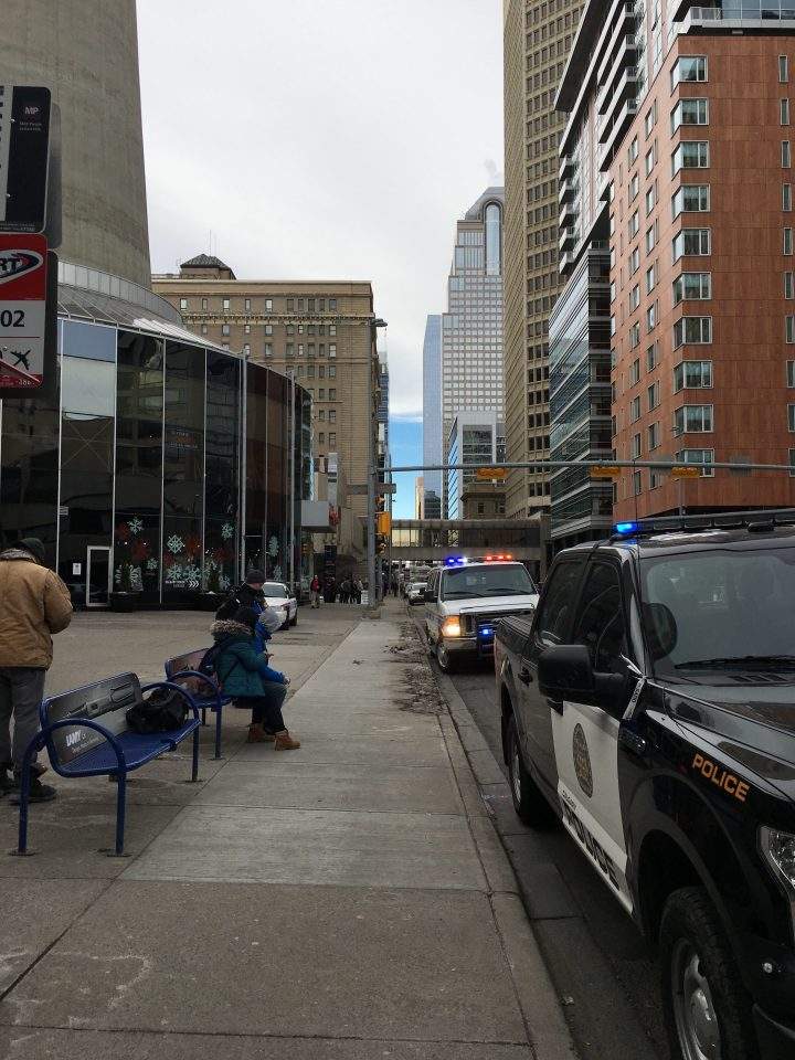 Calgary police officers and vehicles could be seen outside the Calgary Tower on Thursday as authorities across North America dealt with numerous bomb threats.