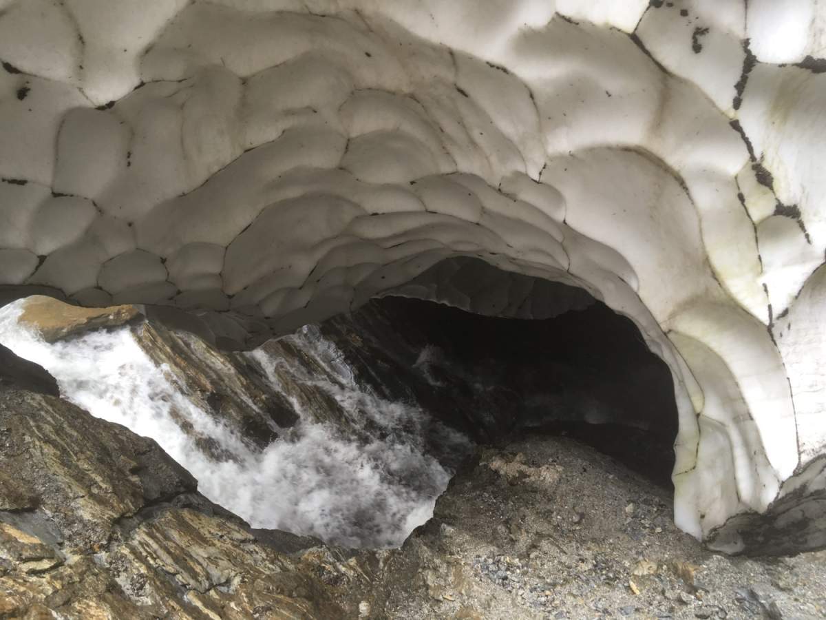 Water rushes into the cave. The team believes the water exits the ground as a stream about two kilometres away.