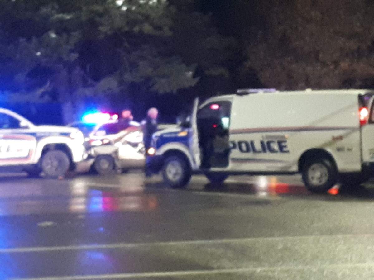 London police say two people are in custody after an incident early Wednesday morning in which multiple police cruisers were damaged.