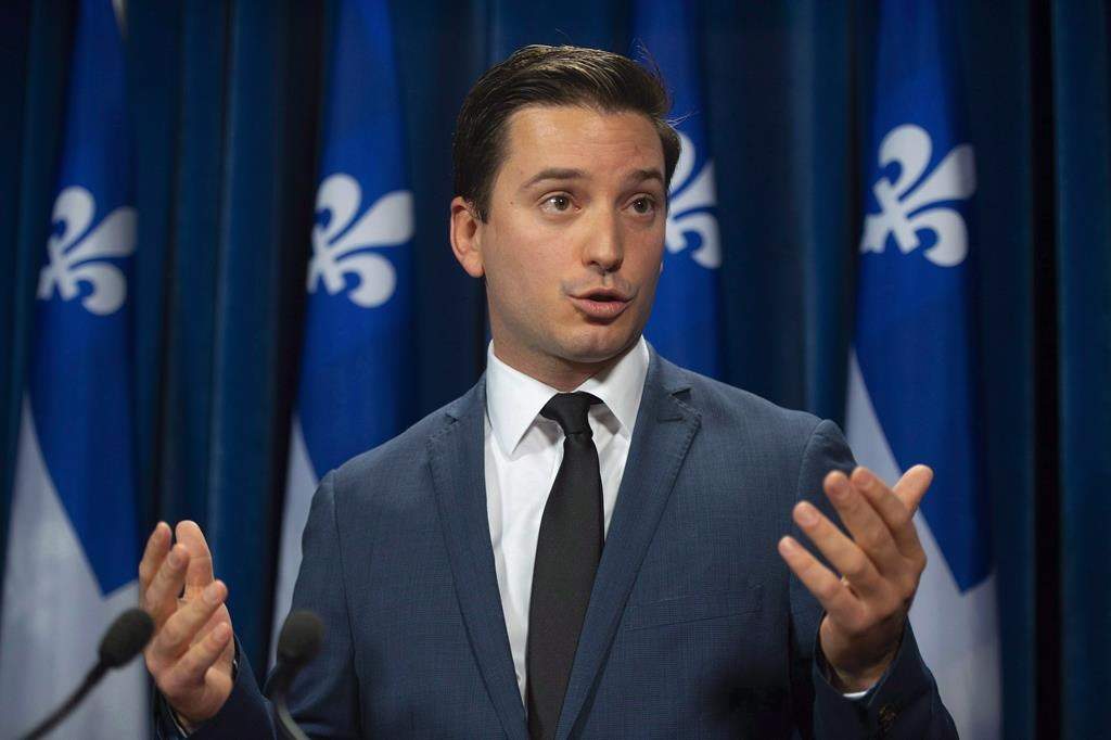 Coalition Avenir Quebec MNA Simon Jolin-Barrette responds to reporters questions on Tuesday, October 9, 2018 at the legislature in Quebec City.