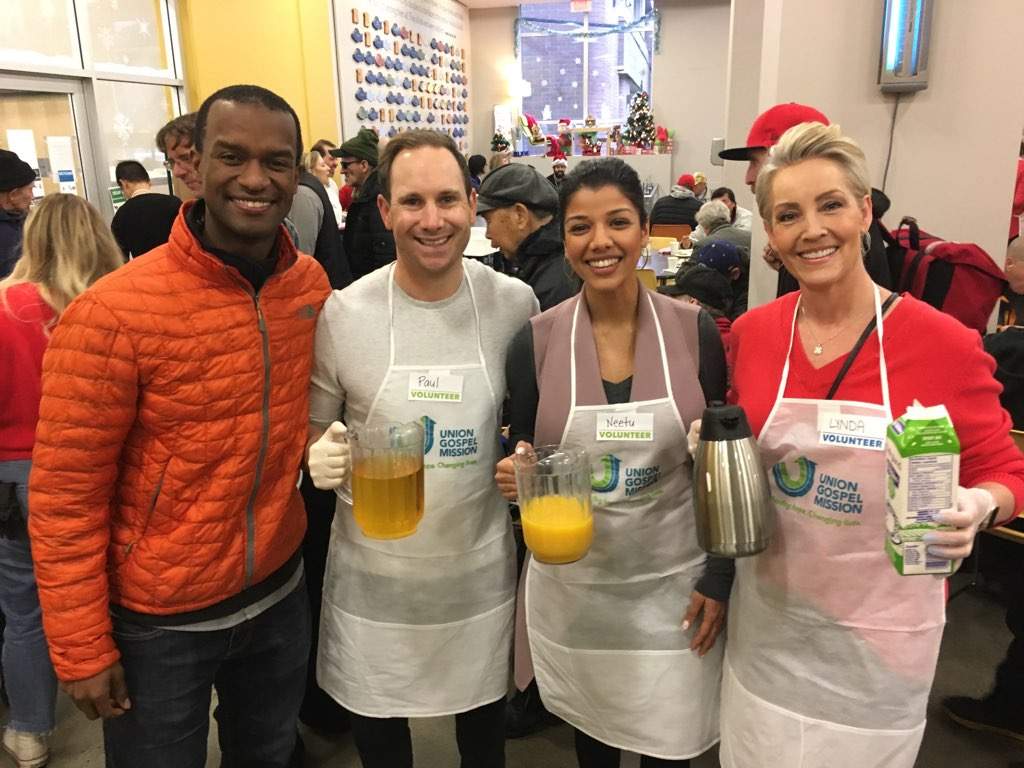 Global BC’s Michael Newman, Paul Haysom, Neetu Garcha and CKNW\’s Lynda Steele help serve Christmas dinner at the UGM.