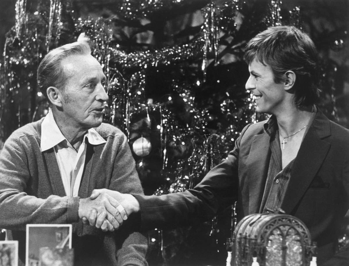 Bing Crosby and David Bowie shake hands on the television special ‘Bing Crosby’s Merrie Olde Christmas’, which aired on Nov. 30, 1977.