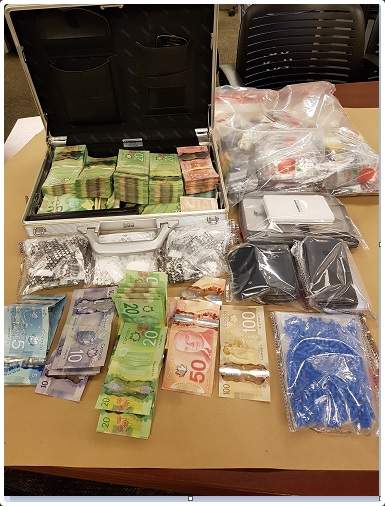 London police seized over $50,000 in cash and drugs during a search of a home on Gladman Avenue on Wednesday, Dec. 19, 2018. 
