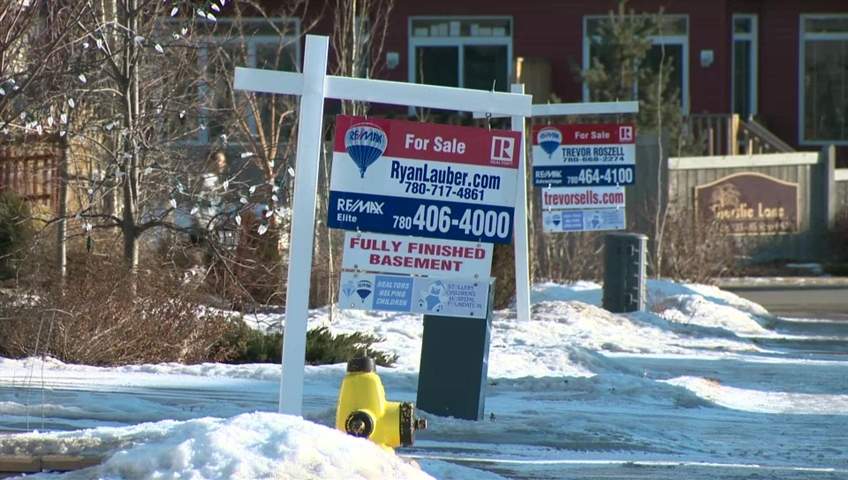 Real estate signs in Edmonton, Alta. on Sunday, December 9, 2018. Home prices have descreased by up to $50,000 compared to the peak in spring.