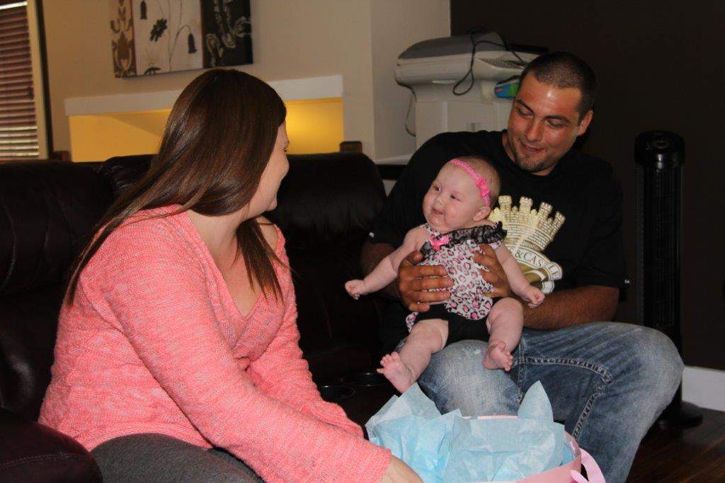 Lamille Harder (R) with Dallas Forbes and eldest daughter Lily.