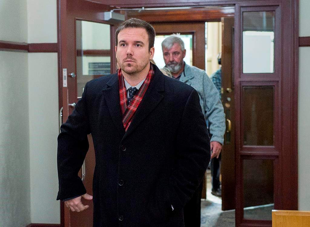 Const. Laurence Gary Basso heads from provincial court in Halifax on Wednesday, Dec. 5, 2018. Basso faces charges of assault and falsifying information in police reports relating to the alleged assault of a man at a homeless shelter. THE CANADIAN PRESS/Andrew Vaughan