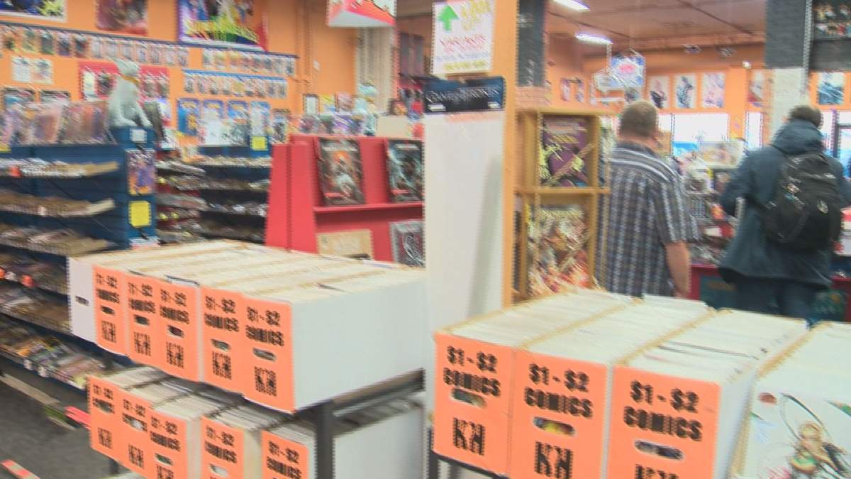 Customers check out products at Happy Harbor comics in Edmonton. 