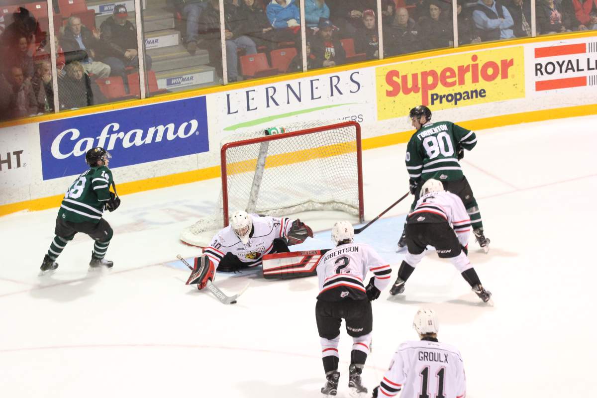 Owen Sound, Ont. - Attack goaltender Andrew MacLean makes one of his 42 saves against the London Knights in a 5-1 win on December 8, 2018.
