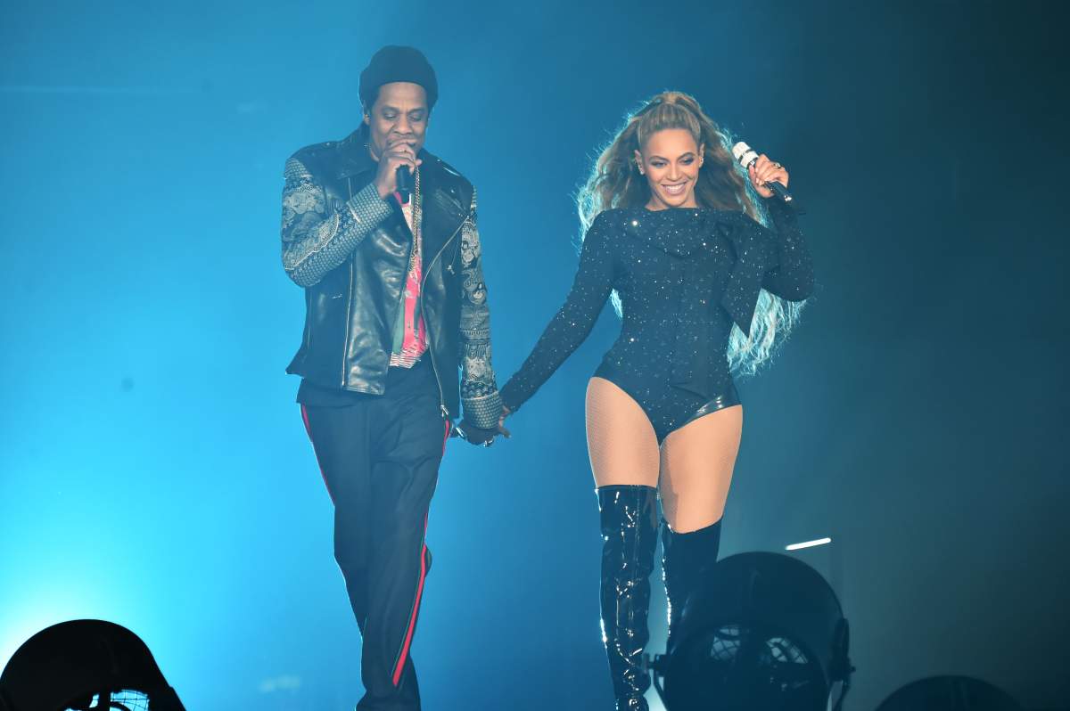Beyoncé and Jay-Z perform together holding hands onstage during the ‘On the Run II’ Tour at Hampden Park on June 9, 2018, in Glasgow, Scotland.