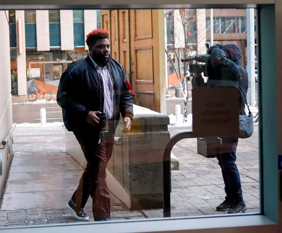 Calgary Stampeders’ Derek Dennis, arrives for the trial of Nelson Tony Lugela, charged in the shooting death of Calgary Stampeder Mylan Hicks, in Calgary, Monday, Dec. 3, 2018.THE CANADIAN PRESS/Jeff McIntosh