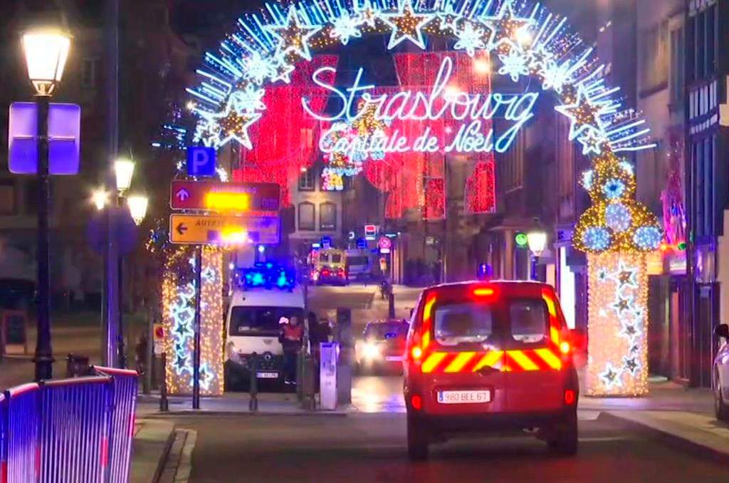 In this image made from video, emergency services arrive on the scene of a Christmas market in Strasbourg, France, Tuesday, Dec. 11, 2018.