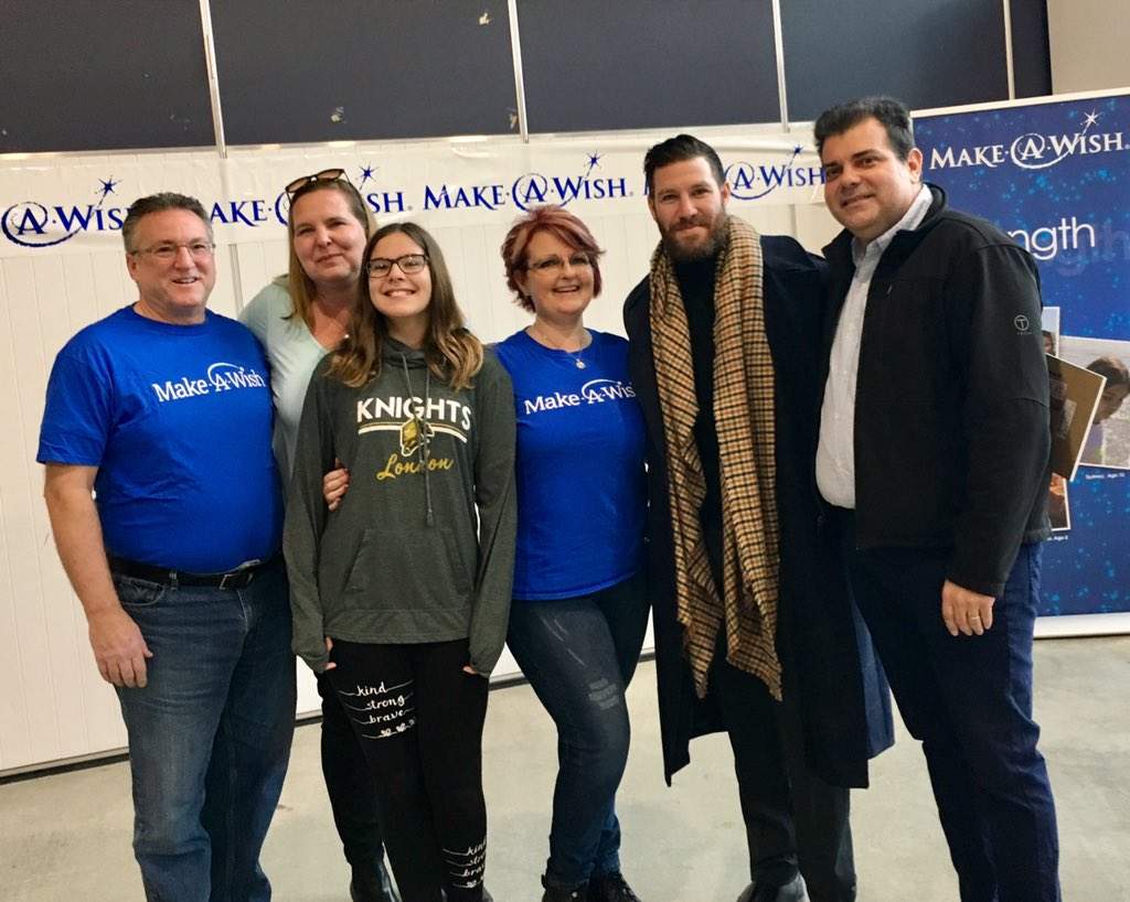 (From left to right) Make-A-Wish Southwestern Ontario volunteer wish granter Wayne Harvey, Debbie Pires, Samantha Pires, Make-A-Wish Southwestern Ontario volunteer wish granter Jen Harvey, former NHL player Brandon Prust and Nelson Pires pose for a group photo following the Make-A-Wish Southwestern Ontario wish reveal at Covent Garden Market on Monday, Dec. 17, 2018. 