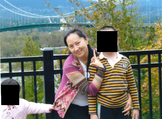 Meng Wanzhou with family near the Lions Gate Bridge.