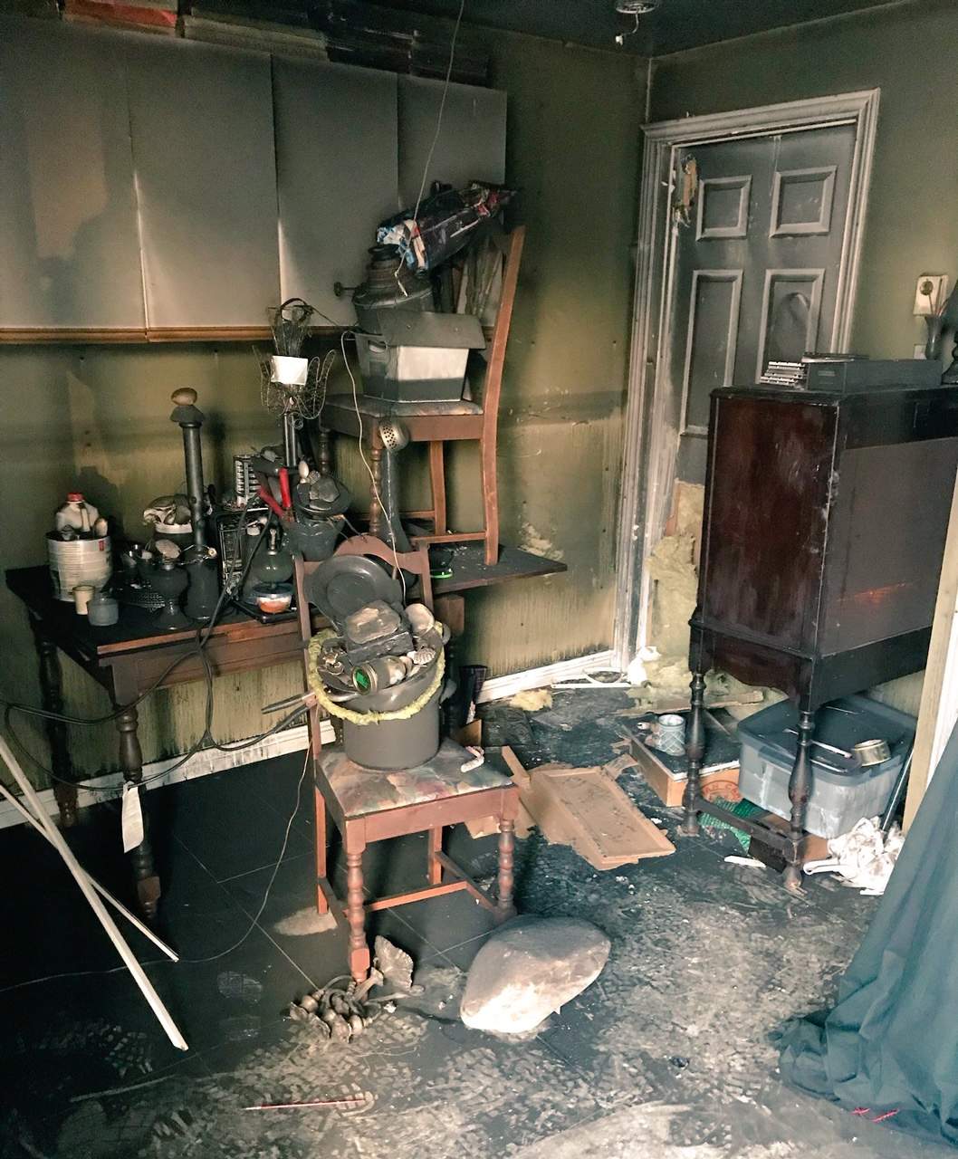 A fire set in an apartment building in Napanee over the weekend caused over $10,000 in damage, police say.