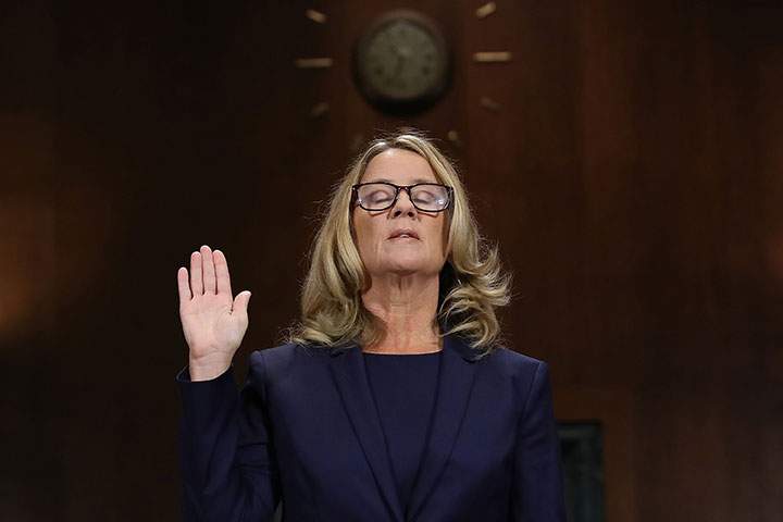 Christine Blasey Ford is sworn in before testifying the Senate Judiciary Committee in the Dirksen Senate Office Building on Capitol Hill September 27, 2018 in Washington, DC.