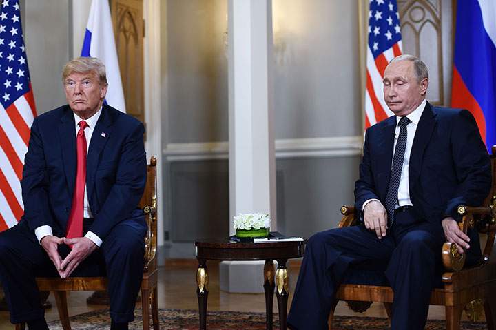 Russian President Vladimir Putin and U.S. President Donald Trump attend a meeting in Helsinki, on July 16, 2018.