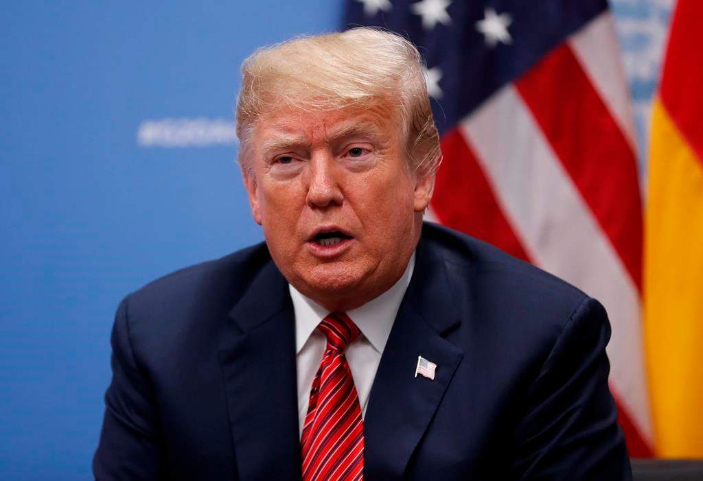 FILE - In this Dec. 1, 2018, file photo, President Donald Trump speaks to media at the G20 summit, in Buenos Aires, Argentina.