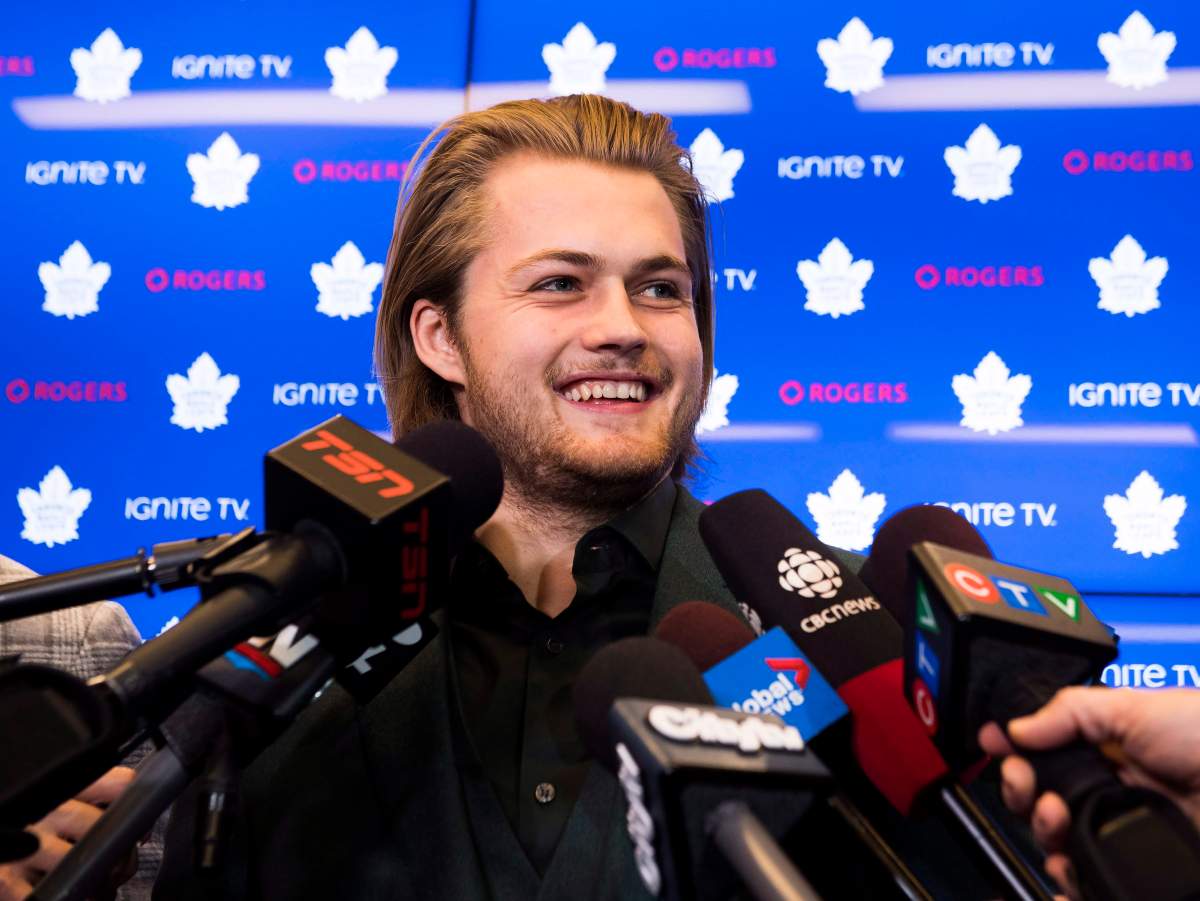 Toronto Maple Leafs forward William Nylander smiles as he speaks to the media regarding his new contract in Toronto on Monday, Dec. 3, 2018.