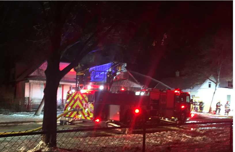Fire crews fight flames outside of the house, as it was deemed unsafe to go inside.