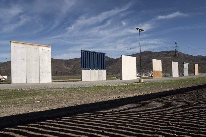 Border wall prototypes stand in San Diego near the Mexico U.S. border, seen from Tijuana, Saturday, Dec. 22, 2018.
