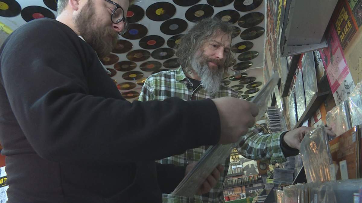 Shawn Ellingham and Adam Reider look through records at Sound Central