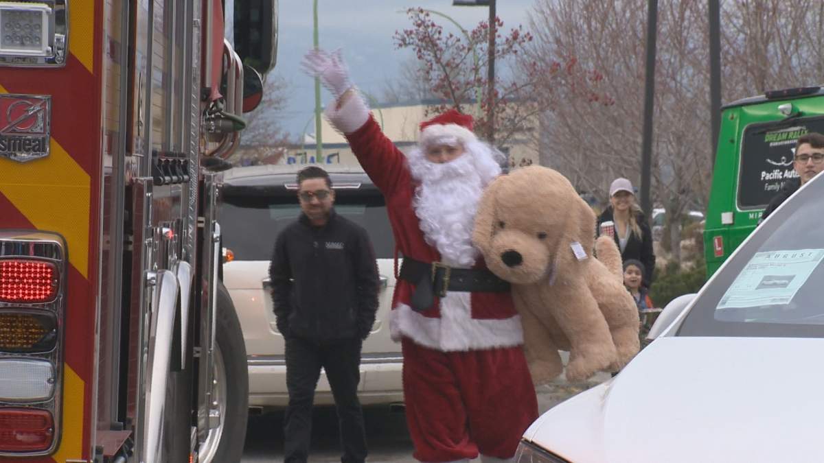Santa was on hand at August Luxury Motorcars on Sunday to help with their annual toy drive. 