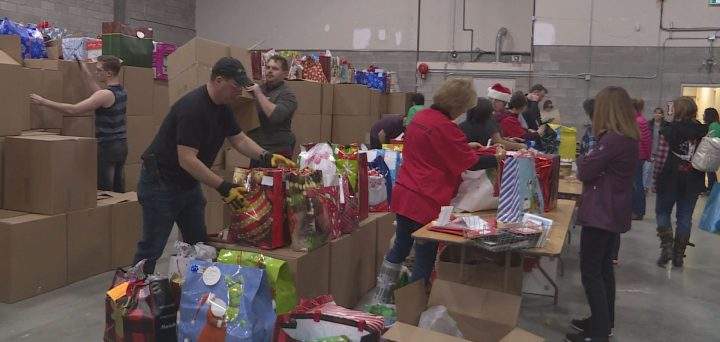 Volunteers sorted Christmas gifts for 5,100 isolated Calgary seniors on Dec. 1.